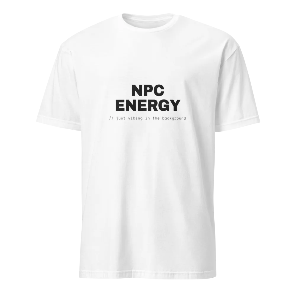 White t-shirt with bold black NPC ENERGY text and a '// just vibing in the background' code caption. - White